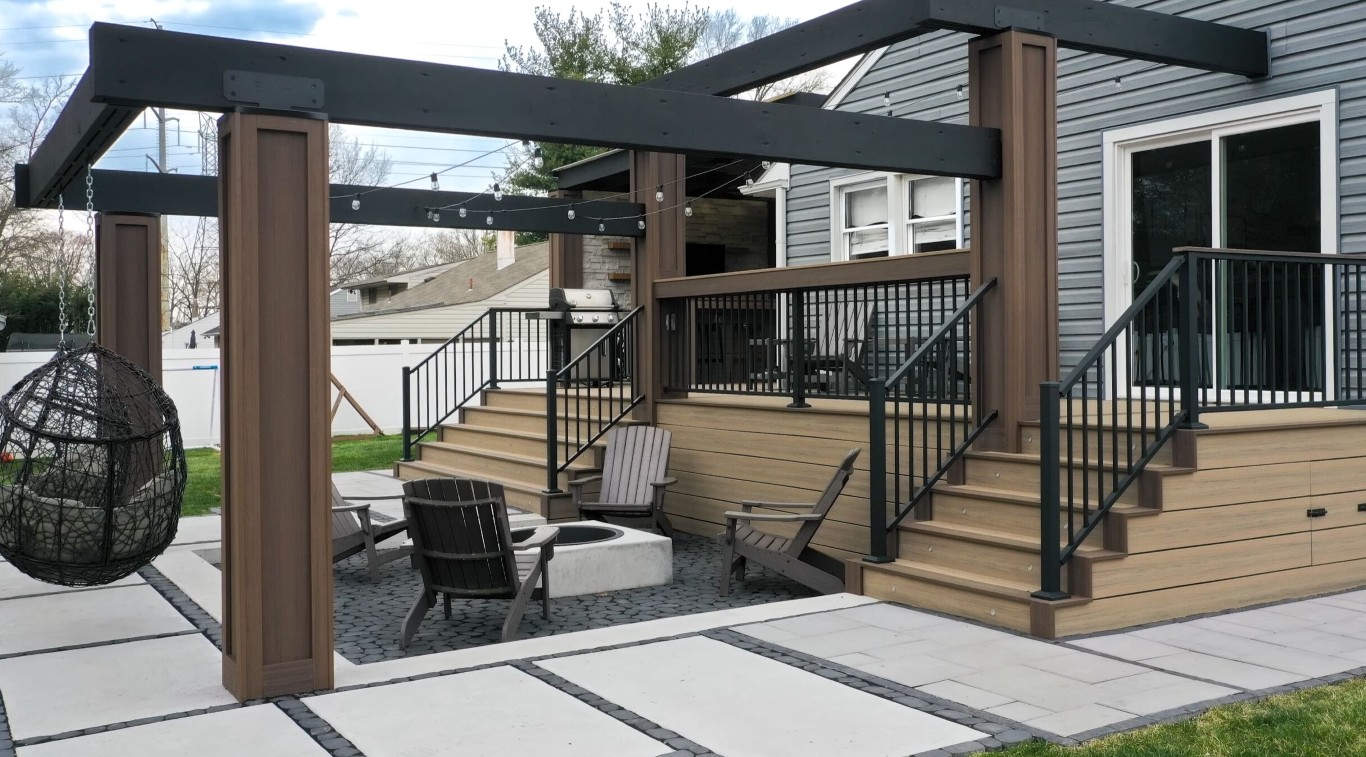 Luxury multi-level deck creating a resort-like backyard experience in Irondequoit, NY